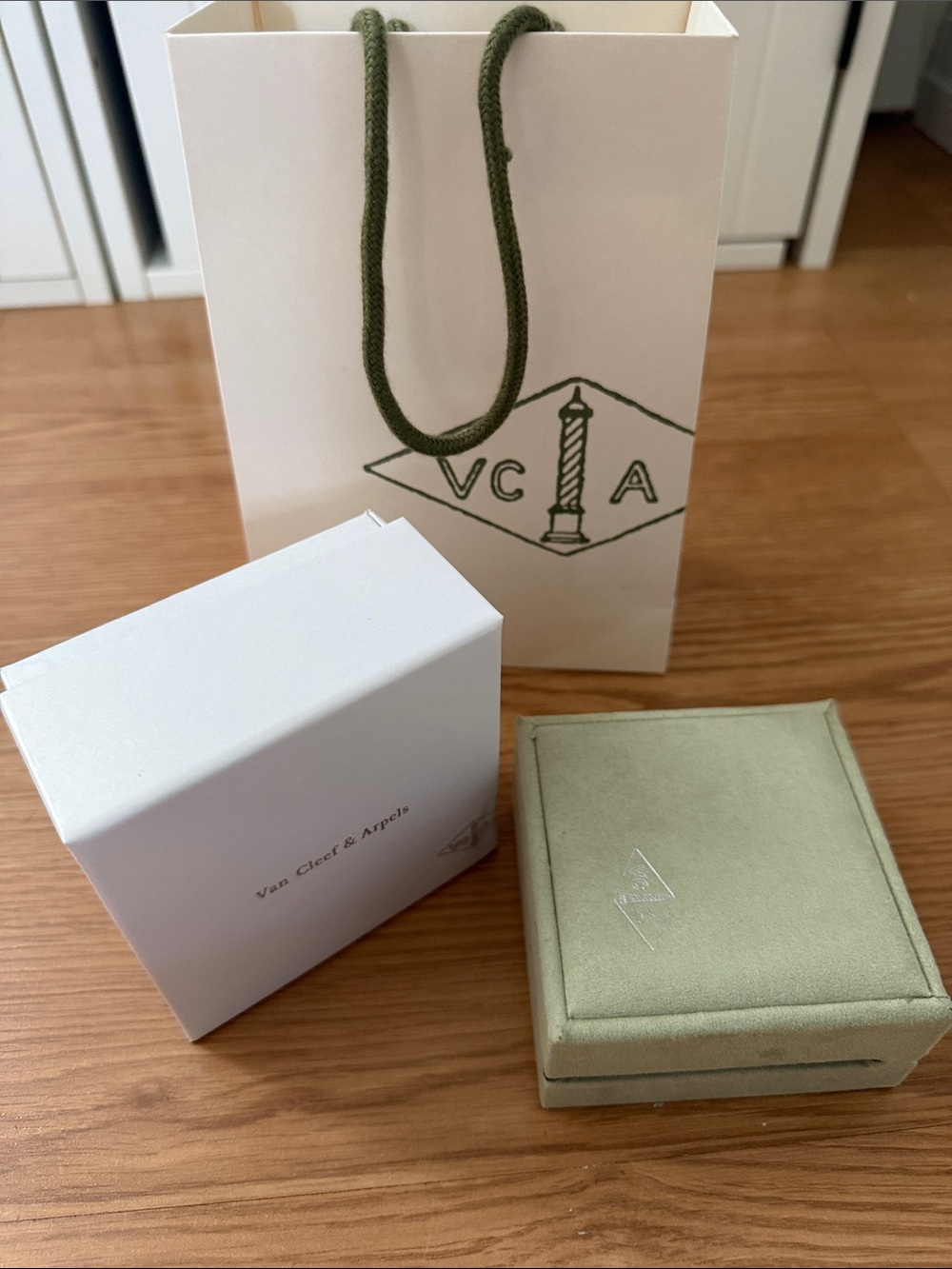 Van Cleef & Arpels light green velvet jewelry box with branded bag